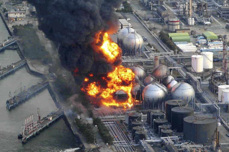 Image: Natural gas storage tanks burn at Cosmo oil refinery in Ichihara city